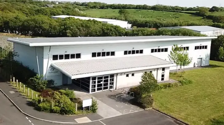 Another old ATC Drivetrain plant with a large white building